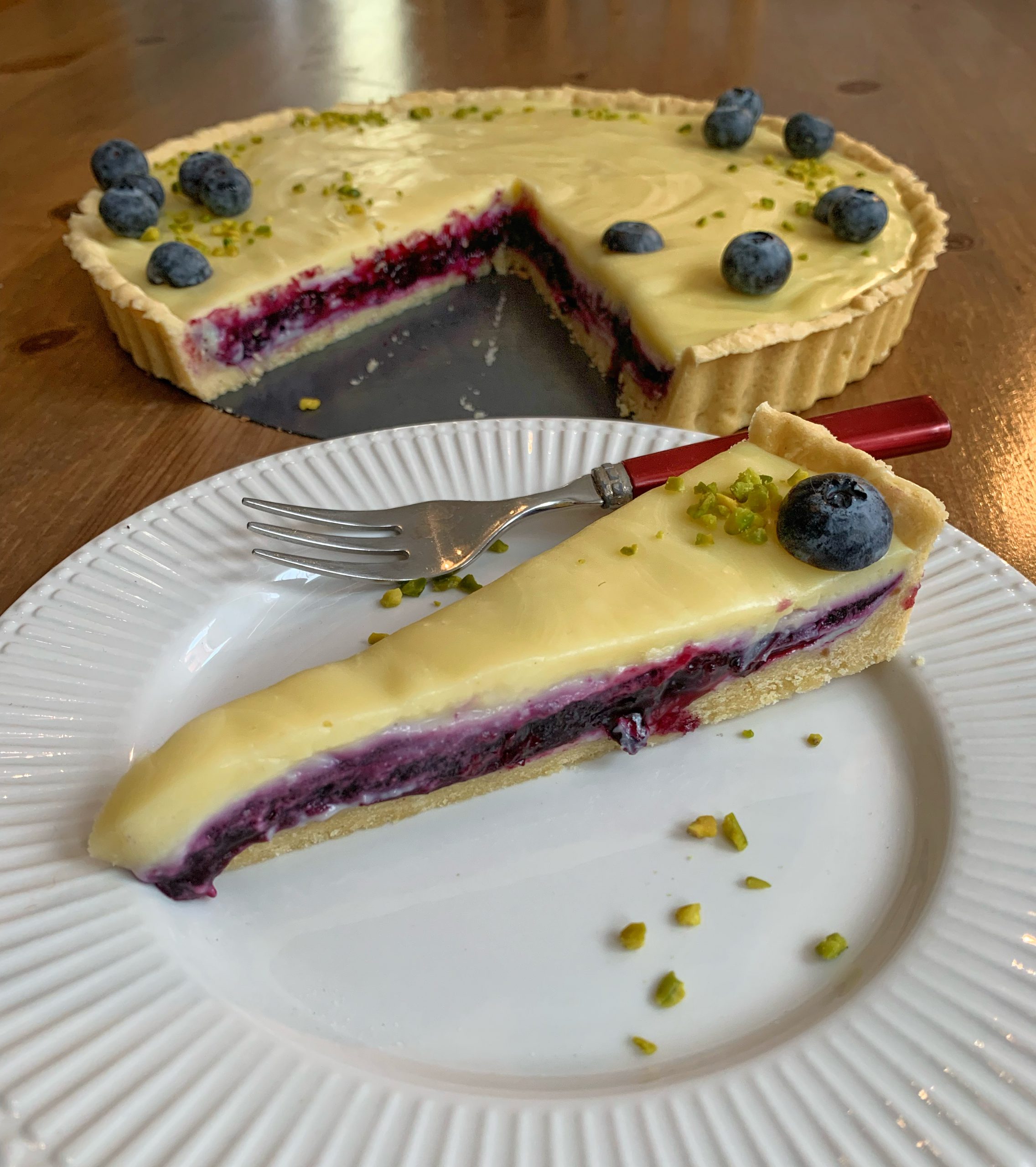 Weiße Trüffel-Heidelbeer-Tarte